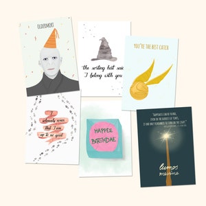 May include: Set of six illustrated greeting cards featuring Harry Potter themed designs. The cards feature a sorting hat, a snitch, a wand, a quote about happiness, a birthday card, and a card with the character Voldemort.
