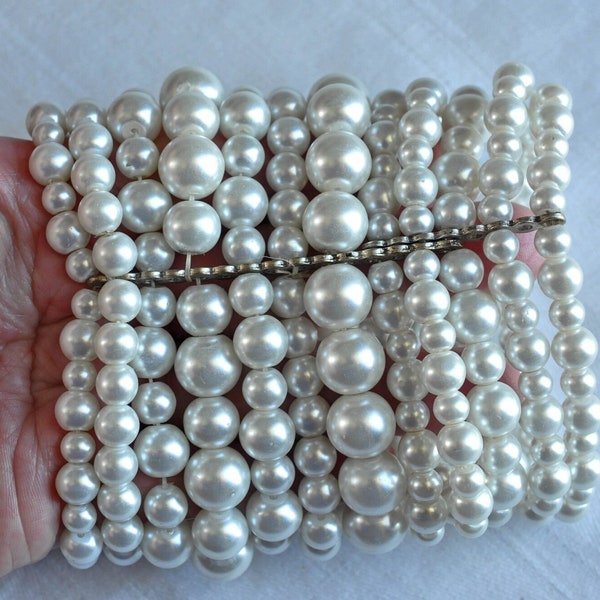 Extra wide faux pearl cuff bracelet.  12 strands of beautiful shiny pearls in varying sizes.  Brutalist, 80s, Bridal, multi strand bracelet.