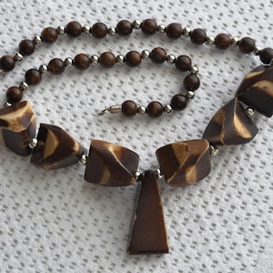 Early Gerda Lynggaard 3 tone Bone necklace, 70s.  Large trapezoid chunks, small marbled plastic and chromed metal beads.  Hippie, Brutalist.
