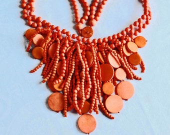 Very large orange wood bib necklace.  Designer, Gerda Lynggaard for Monies, long bib necklace from the 80s.  Avant Garde statement necklace.
