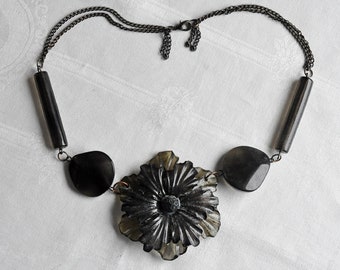 Large Galalith flower pendant, necklace.  Heavily carved, Prystal grey, Galalith daisy flower.  Large side beads.  Hippie pendant, necklace.