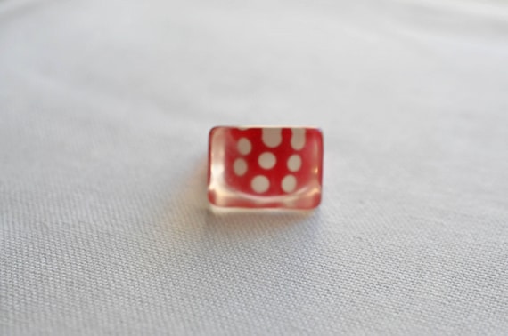 Clear Lucite rectangular ring.  Red background wi… - image 1