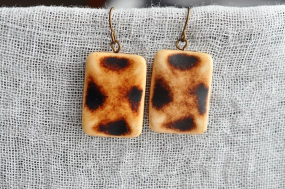 Carved animal print Galalith earrings.  Carved in… - image 5