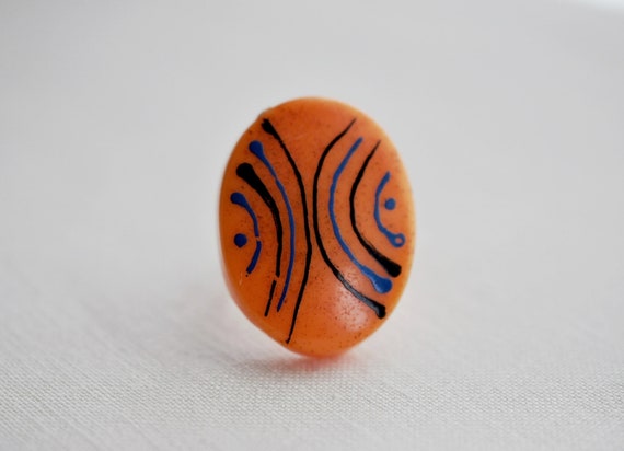1970s adjustable orange oval ring.  Blue and blac… - image 1