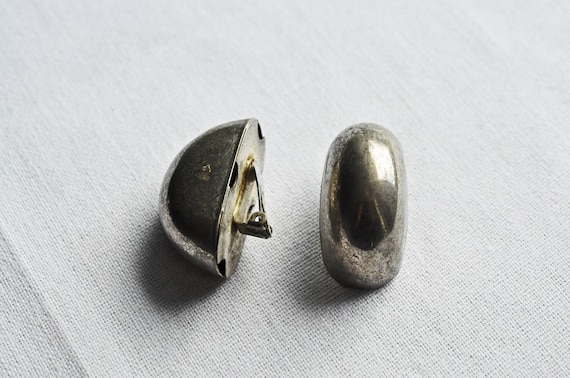 High domed silver toned clip on earrings.  Half m… - image 1