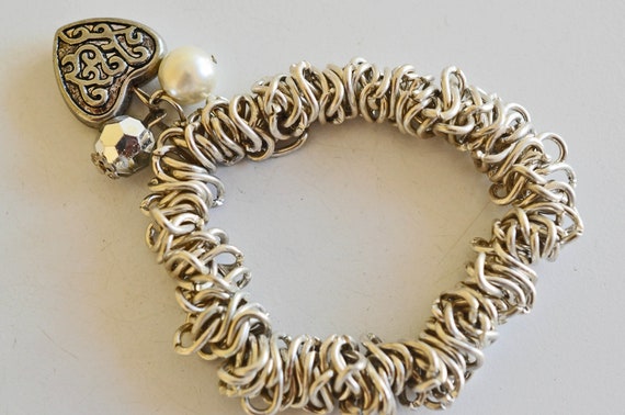 Silver chain mail, stretch bracelet with a Repous… - image 3