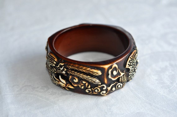 Intricately carved Bakelite bangle, bracelet.  Br… - image 1
