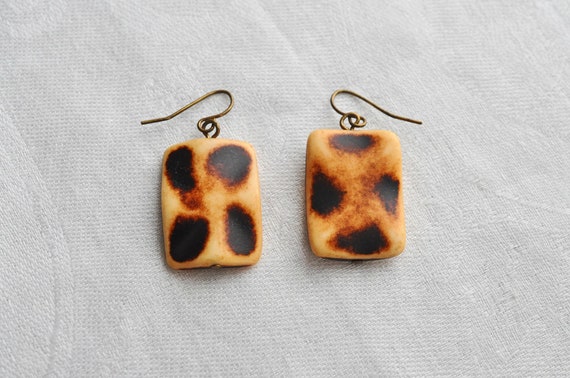 Carved animal print Galalith earrings.  Carved in… - image 4