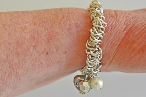 Silver chain mail, stretch bracelet with a Repous… - image 4