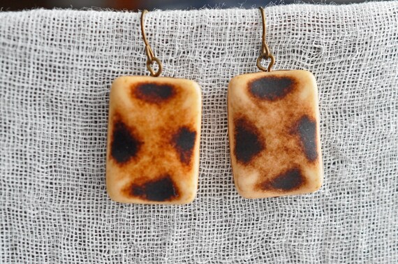 Carved animal print Galalith earrings.  Carved in… - image 3