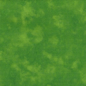 May include: A green fabric with a subtle, mottled pattern. The fabric has a soft, textured feel.