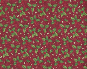 May include: Red fabric with a repeating pattern of green holly leaves and white berries.