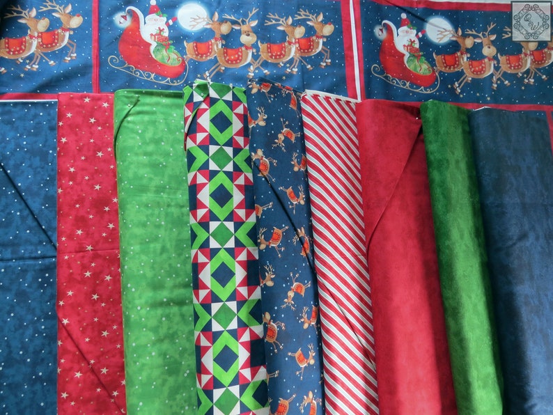May include: Assortment of fabric scraps in various Christmas patterns, including red and green plaid, blue with reindeer, and red with white stars.