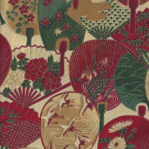 May include: A beige fabric with a repeating pattern of red, green, and gold fans. The fans are decorated with flowers, birds, and other designs. The fabric is measured with a ruler in inches.
