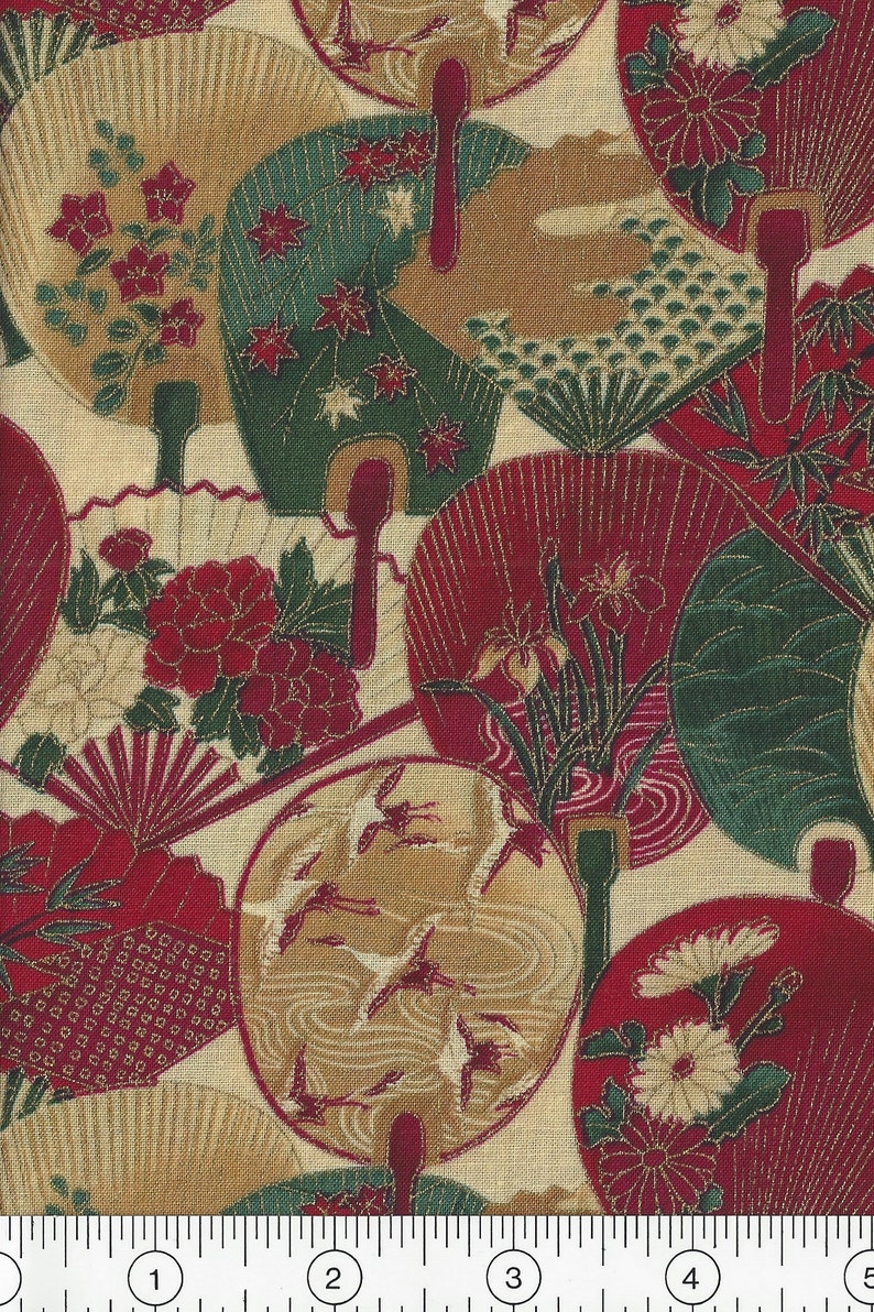 May include: A beige fabric with a repeating pattern of red, green, and gold fans. The fans are decorated with flowers, birds, and other designs. The fabric is measured with a ruler in inches.