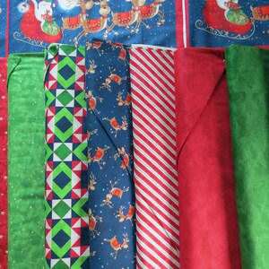 May include: Assortment of 10 fabric scraps in various Christmas patterns, including red and white stripes, green with white stars, blue with reindeer, and green with geometric shapes.