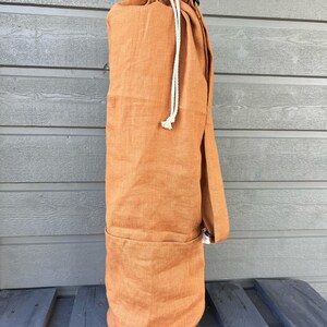 Linen mat bag with adjustable handle. 100% natural linen bag is perfect to carry standard mat for yoga, pilates or any other activity.