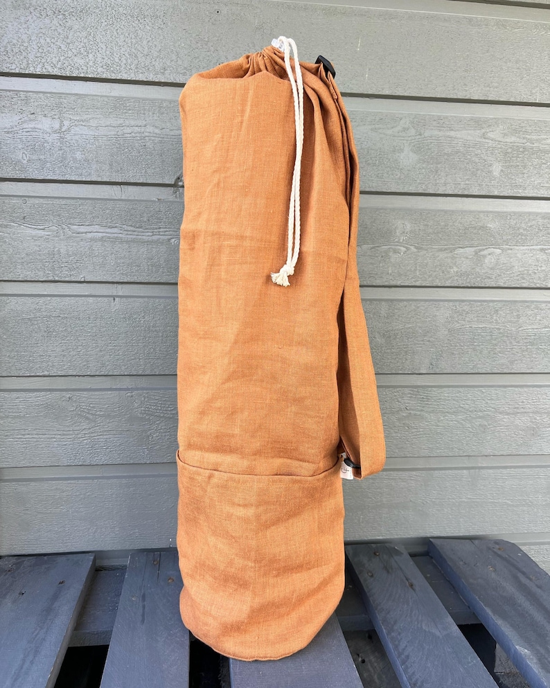 Linen mat bag with adjustable handle. 100% natural linen bag is perfect to carry standard mat for yoga, pilates or any other activity.