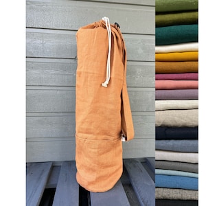 Linen mat bag with adjustable handle. 100% natural linen bag is perfect to carry standard mat for yoga, pilates or any other activity.