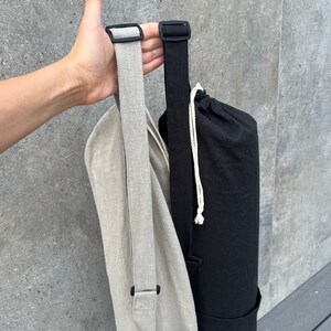 Linen mat bag with adjustable handle. 100% natural linen bag is perfect to carry standard mat for yoga, pilates or any other activity.