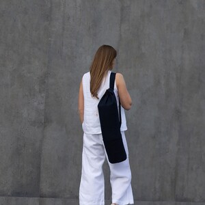 Linen mat bag with adjustable handle. 100% natural linen bag is perfect to carry standard mat for yoga, pilates or any other activity.