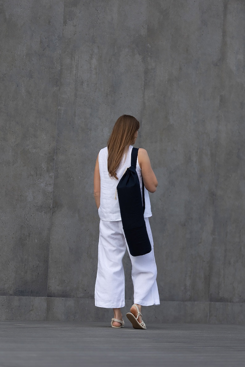Linen mat bag with adjustable handle. 100% natural linen bag is perfect to carry standard mat for yoga, pilates or any other activity.