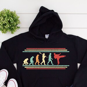 Taekwondo Hoodie, Evolution Taekwondo Shirt für Männer, Geschenk für Tae Kwon Do Kämpfer, Martial Arts Dad Langarm Unisex Kapuzenpullover