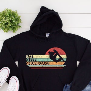 Eat Sleep Snowboard Shirt, Snowboarding Hoodie, Snowboarder Geschenk, Boarding Kleidung, Unisex Heavy Blend Kapuzen-Sweatshirt