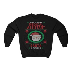 Medical Assistant Ugly Christmas Sweatshirt, Nurse and Hospital Staff Holiday Shirt Unisex Heavy Blend Crewneck Sweatshirt image 2