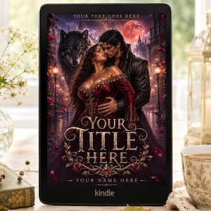May include: A black e-reader displaying a digital book cover featuring a couple in a romantic embrace, a large wolf, a red moon, and a gothic castle. The text reads YOUR TEXT GOES HERE, YOUR TITLE HERE, and YOUR NAME HERE. The device has a black frame.