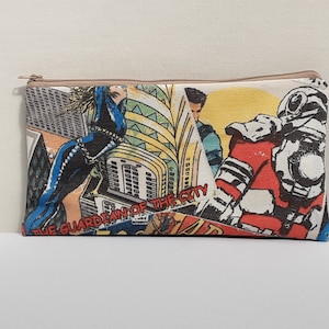 Comic design makeup bag, pencil case, zip wallet in quirky comic fabric. Ideal gift for comic, marvel, DC lovers to keep anything in.