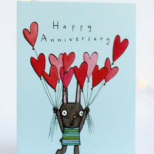 Feliz aniversario. Ama los corazones. Conejo. Te quiero. Globos cardíacos. Tarjeta ilustrada dibujada a mano. pareja, pareja, esposo, esposa.