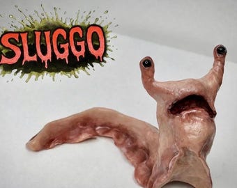 Escultura de babosa hecha a mano con arcilla polimérica: decoración de criaturas extrañas y curiosas.