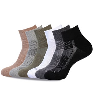 May include: Six pairs of ankle socks in various colors, including brown, gray, green, white, and black. The socks have a textured design and are made of breathable fabric.