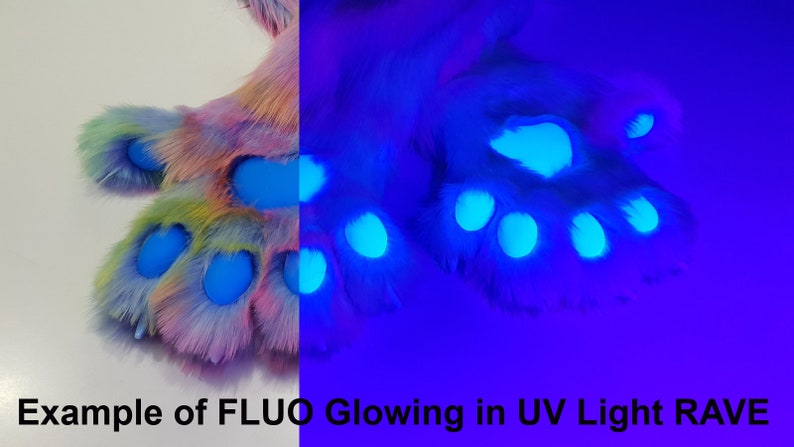 May include: A pair of fluffy rainbow colored paws with blue glow-in-the-dark accents. The paws are shown under a UV light, highlighting the blue glow.