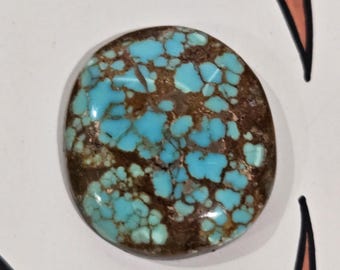 Number Eight Turquoise Mine, 30 carats round backed Cabochon
