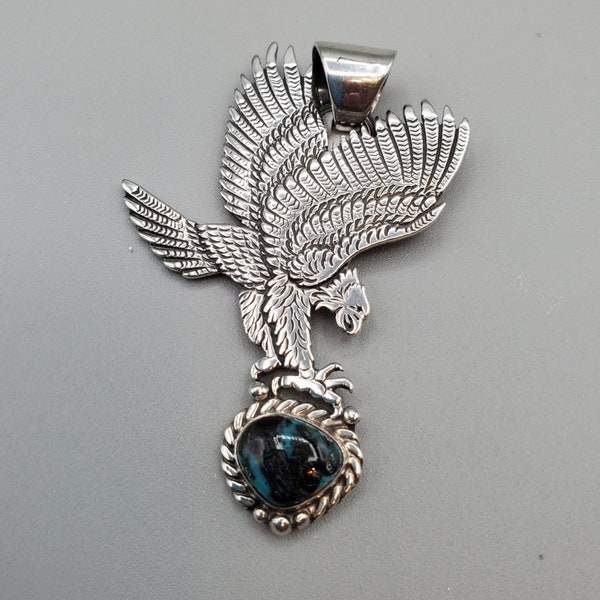 Handcrafted, Turquiose Eagle Pendant,  Sterling Silver, by Navajo Artist Freddy Charley