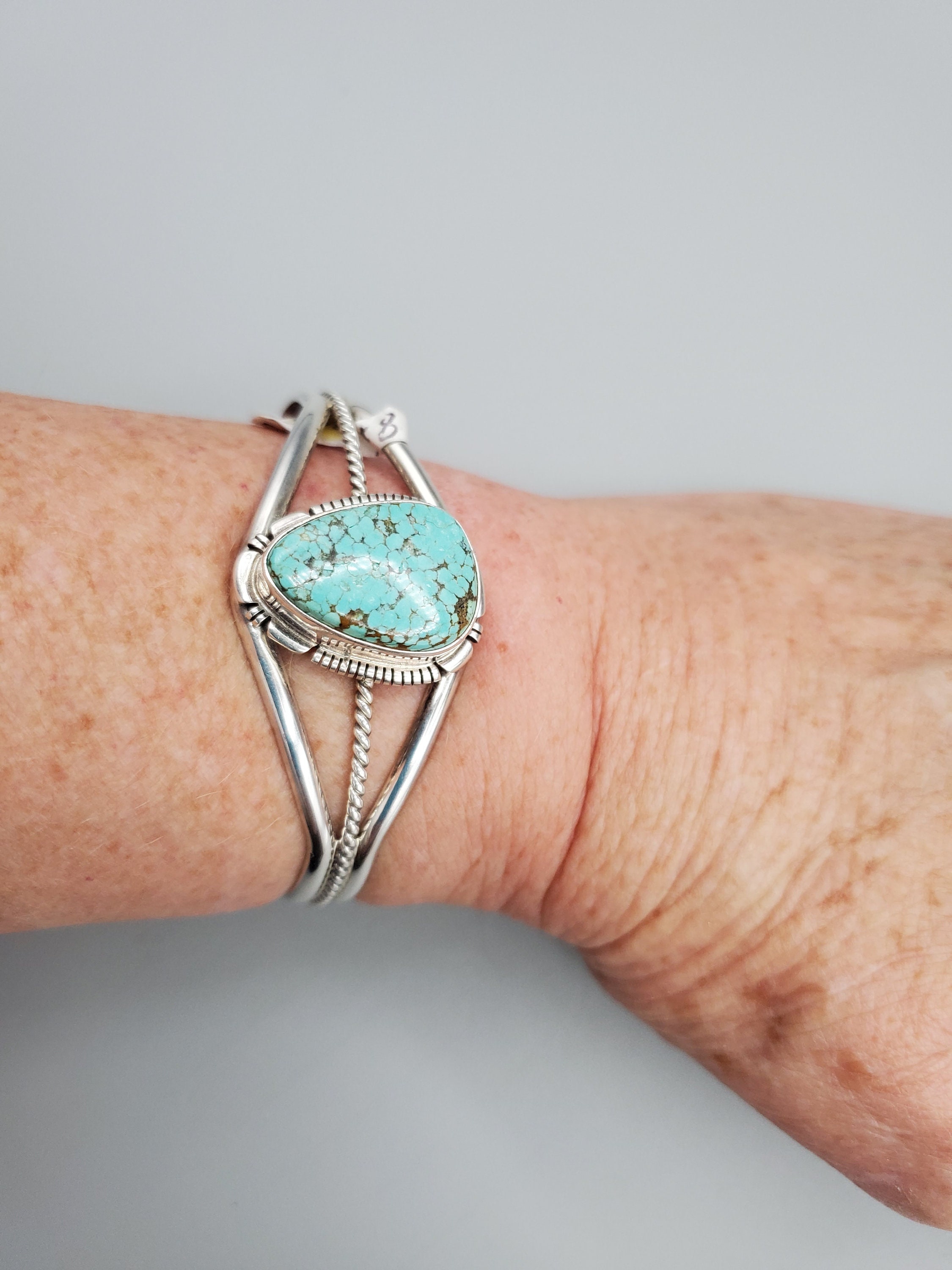Sterling Silver # 8 Turquoise Bracelet by Navajo Moses Sterling Silver # 8 Turquoise Bracelet by Navajo Moses
