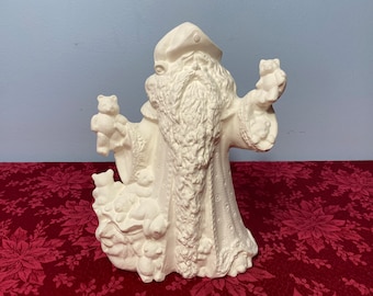Santa With Toy’s Unpainted Ceramic Bisque