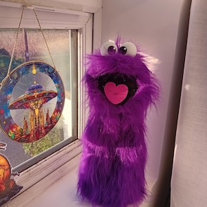 Bright fuzzy hand puppet