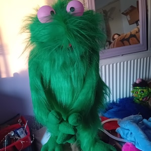 Green fuzzy puppet