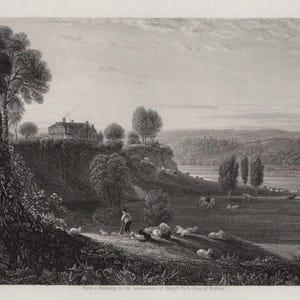 May include: Black and white landscape print depicting a rural scene. A man shepherds sheep on a hillside, with a large house atop a hill in the background. Trees and a river are also visible.