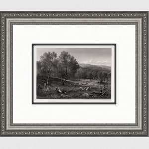 May include: A black and white engraving of a pastoral scene with a shepherd and sheep in a wooded valley. The engraving is framed in a silver frame.