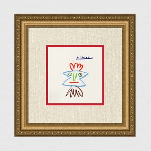 May include: A framed drawing of a colourful abstract face with the signature "Picasso" in blue ink.