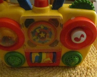 Little Tikes Discover Sounds Boom Box push buttons spins fun box toy