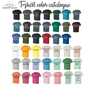 May include: A color chart of t-shirt colors, showing a variety of solid colors and heather colors. The chart is organized in rows and columns, with each color represented by a small t-shirt. The t-shirts are all the same size and shape, and they are arranged in a grid pattern. The chart is labeled with the name of each color, and the text "T-shirt color catalogue" is at the top of the chart.