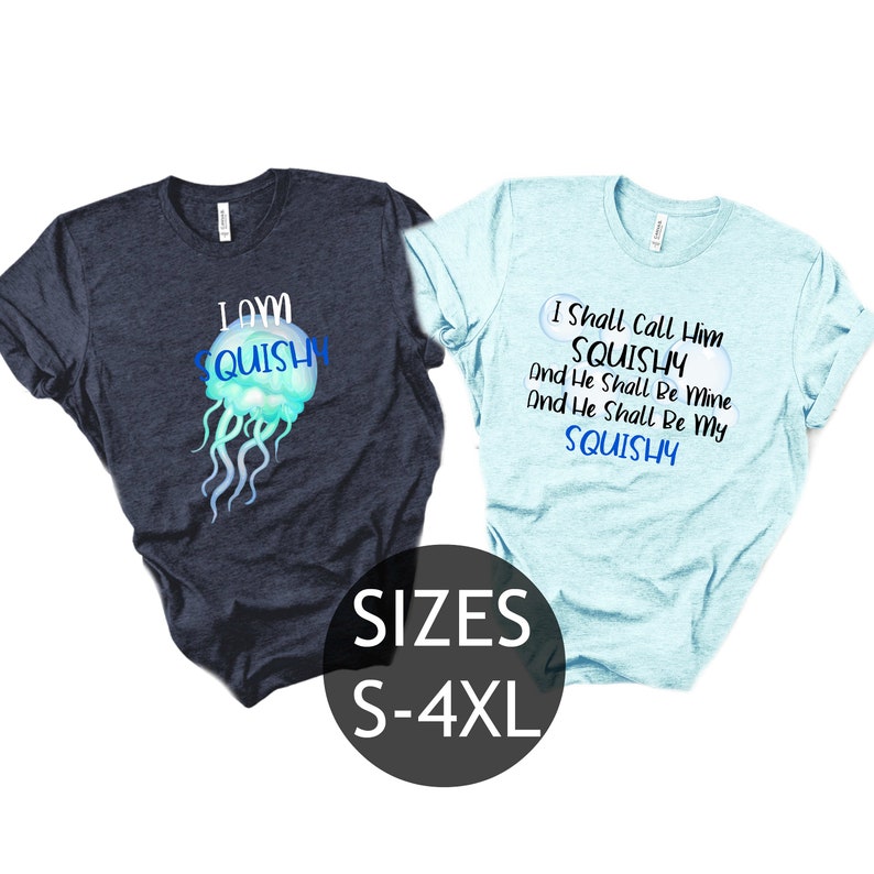 May include: Two t-shirts with a jellyfish graphic and text. The blue shirt says "I Shall Call Him SQUISHY And He Shall Be Mine And He Shall Be My SQUISHY". The dark blue shirt says "I AM SQUISHY". The shirts are available in sizes S-4XL.