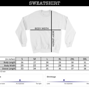 May include: Size chart for a sweatshirt in sizes S through 3XL. The chart shows measurements in inches for body length, body width, and sleeve length. The chart also includes a fit guide and a shrinkage guide.