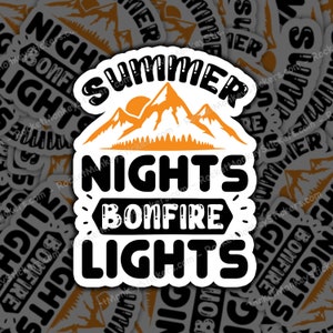 May include: A white sticker with black text that reads "Summer Nights Bonfire Lights". The sticker features a silhouette of mountains with an orange sun setting behind them.
