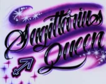 May include: White t-shirt with a purple and black airbrushed design that says "Sagittarius Queen" with a Sagittarius symbol and stars.